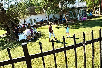 Back of House Looking Over Fence