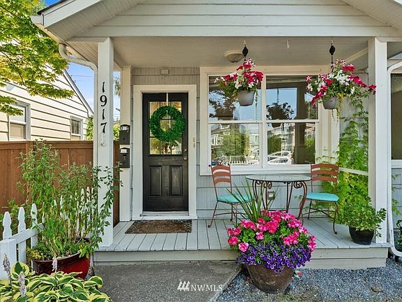 Inviting front porch with entry, hallway and access to both units. 