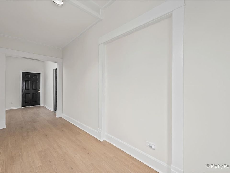 foyer, 240 McHenry Ave is the door straight ahead after entering.