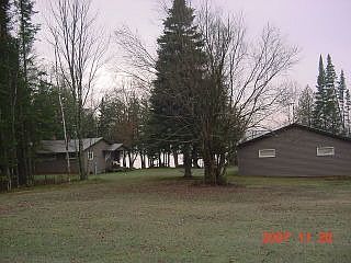 Cabin & garage.  Level lot