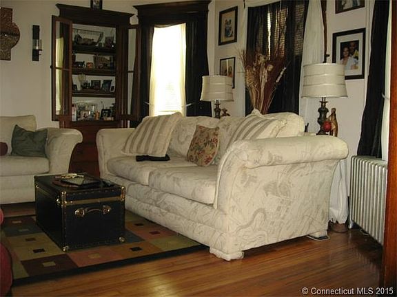 Living room w/Built-in Cabi...