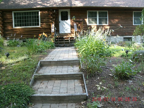 Front walk; low maint yard.