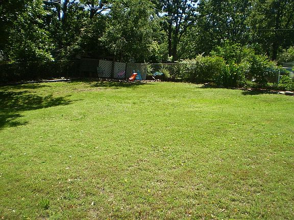Large, fully fenced backyard.