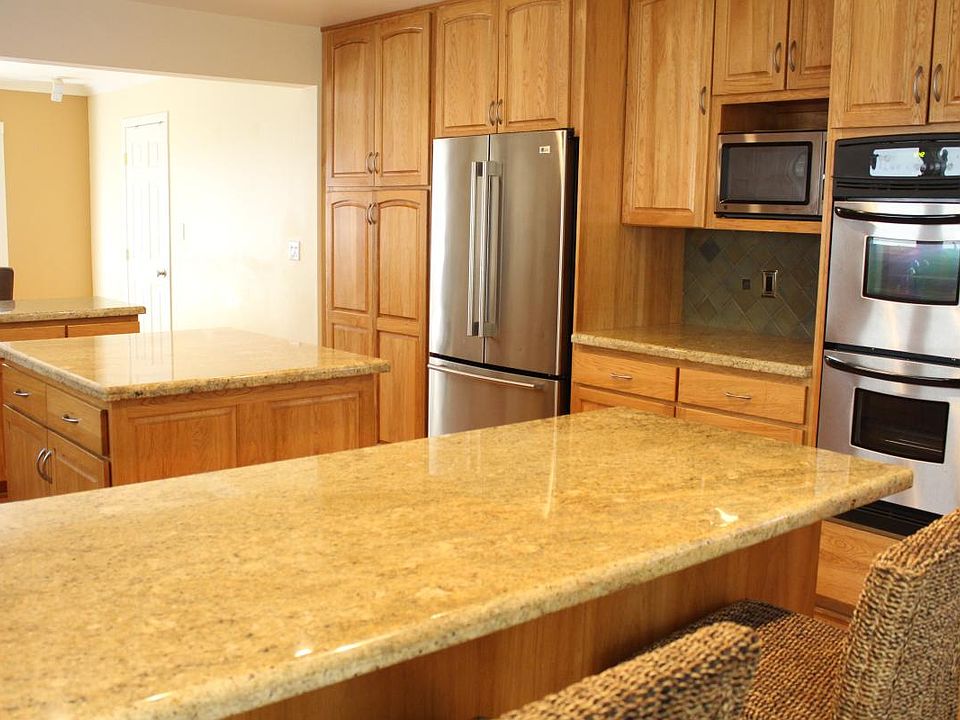 Large Gourmet Kitchen with stainless steel appliances.