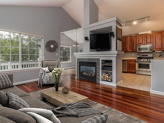 Living room with view of kitchen and dining room