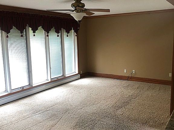 Living room with 5 windows 