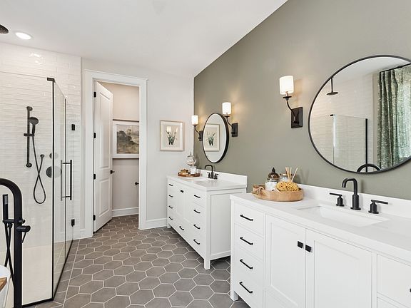 Primary bath with matte black fixtures and hardware