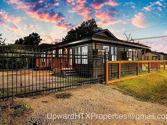 Gate surrounding property, parking inside the gate