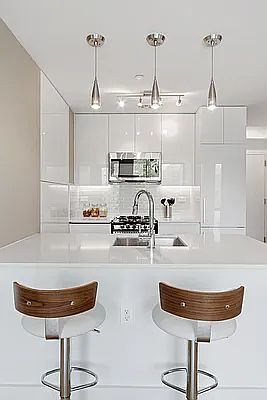 2nd image of 48 E 132nd St Penthouse C