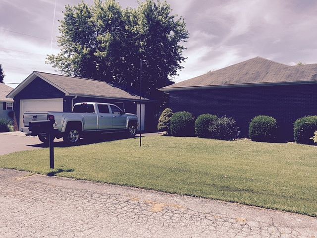 Side view with 2 car garage
