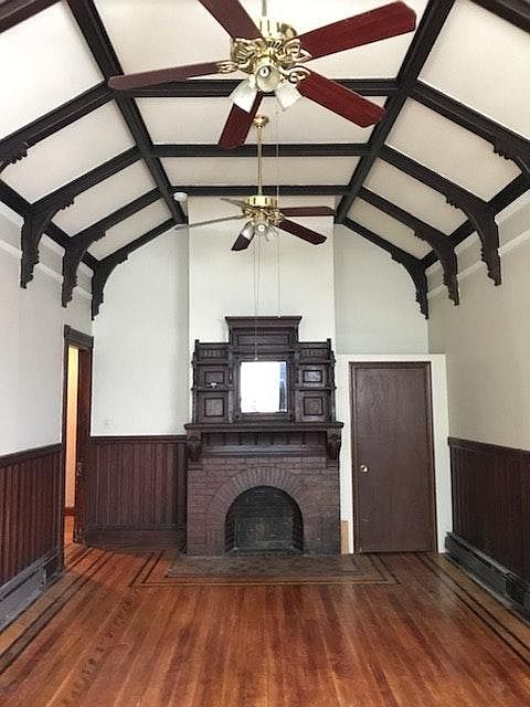 AMAZING bedroom with vaulted ceilings and fireplace