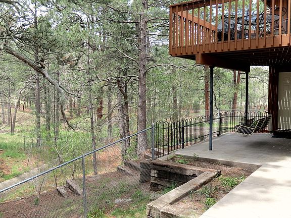 Entry and Lower Level Porch Overlooking Yard and Palmer Park