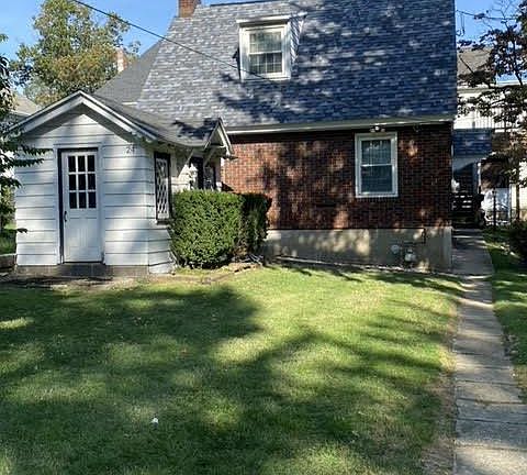 Rear View Of Cottage and Shed