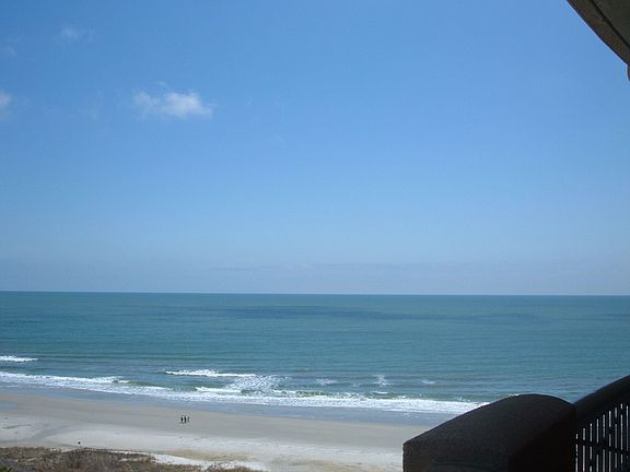 Corner unit offers views of the ocean and plantation