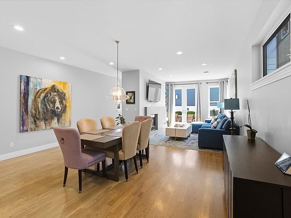 dining/living area which has a open concept living space