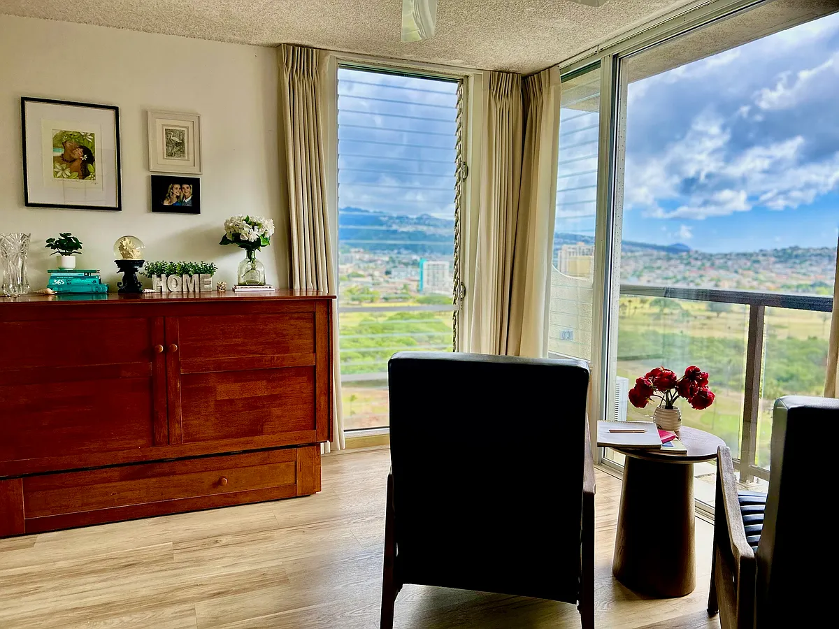 Watch the smart TV, or turn the recliners around and work alongside the front row golf course views, with Koko Head in the distance. Note there's a queen bed in the wood cabinet if you want to sleep in separate rooms. - 444 Nahua St #2101
