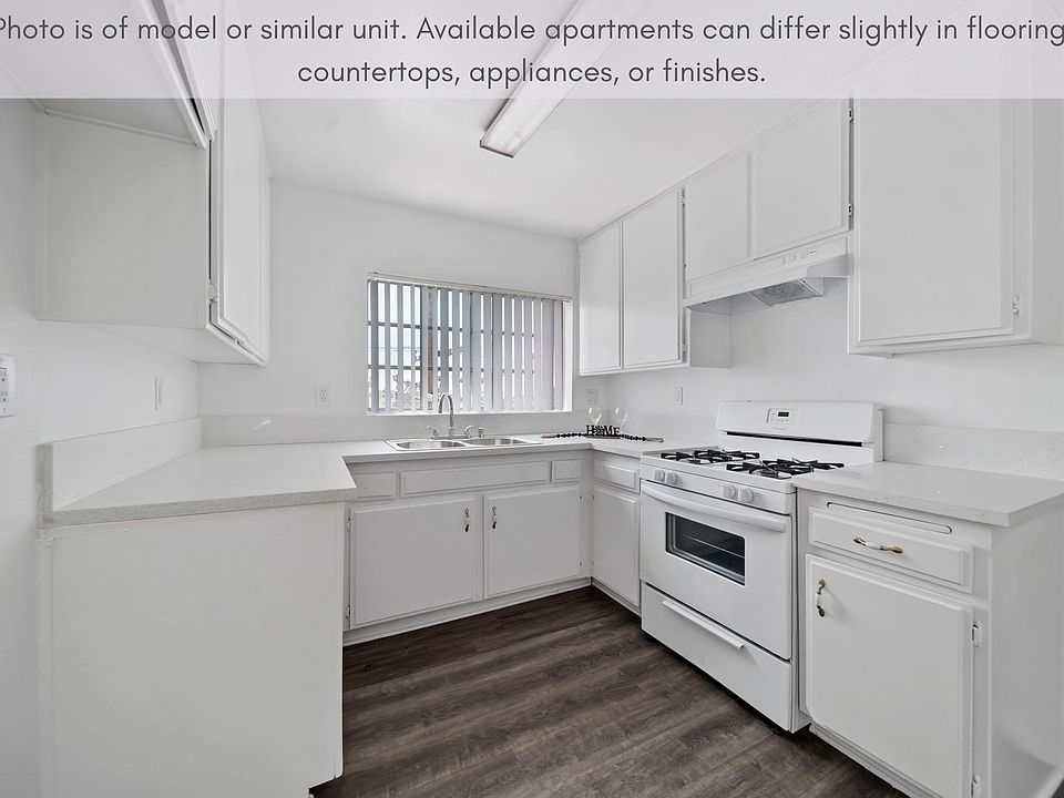 Spacious kitchen featuring generous cabinet storage and a bright, functional layout.