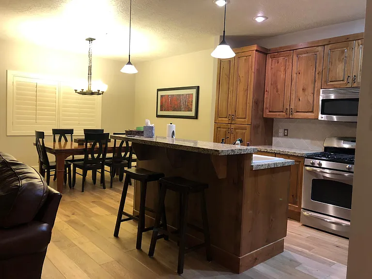 Kitchen. Table that seats up to 8. There is a leaf that extends and extra chairs are in one of the closets.