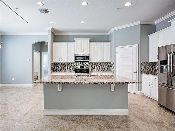 Kitchen with breakfast bar.  All appliances included