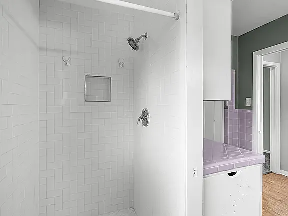 White Subway tiled Shower in Primary Bath