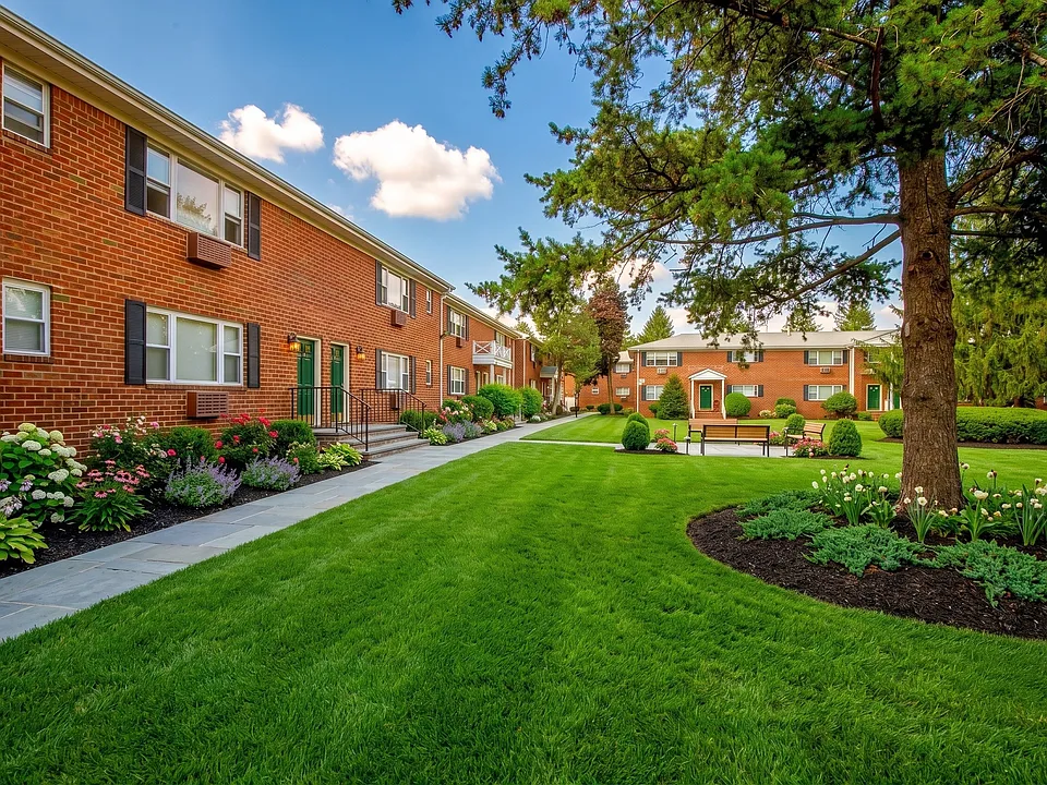 Green Grove Apartments showcases lush landscaping and well-maintained pathways, providing an inviting community atmosphere. Enjoy the tranquility of beautifully manicured grounds and modern living. Schedule a visit today to see your new home!