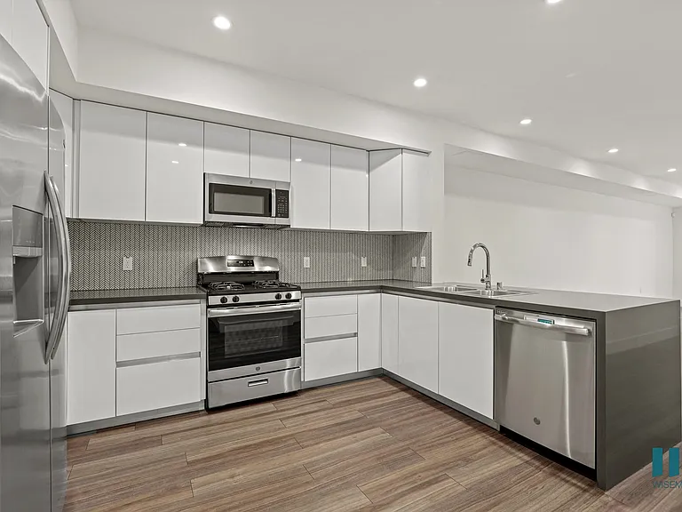 Large-Size Kitchen with Energy-Efficient Appliances and Ample Cabinet Storage