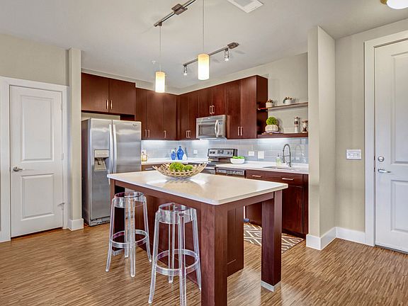 Gorgeous Quartz Countertops with Pendant Lighting
