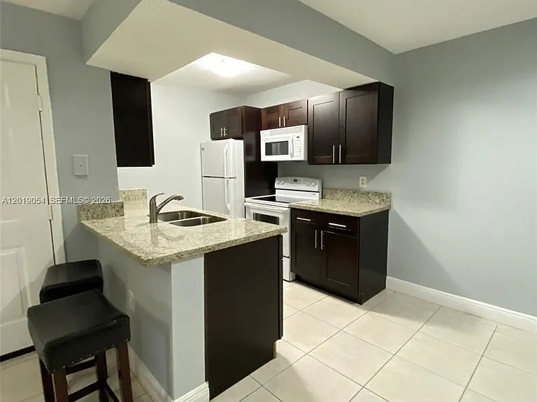 15551 SW 104th Ter #8111 — Photo 2