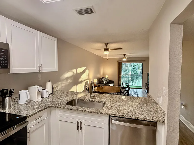 Fully stocked with cooking accessories including - griddle, toaster, plates, utensils, blender, air fryer, single serve coffee maker, tea kettle, pots/pans, mixing bowls, cooking utensils
