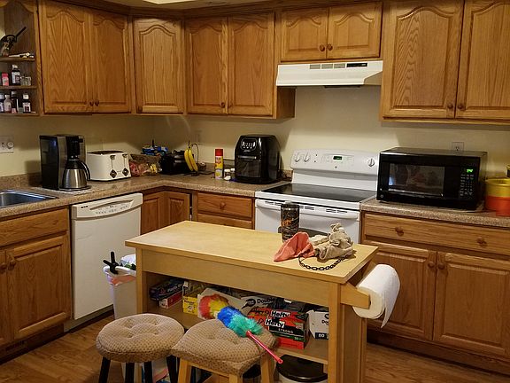 11 × 11 room, new cabinets.

