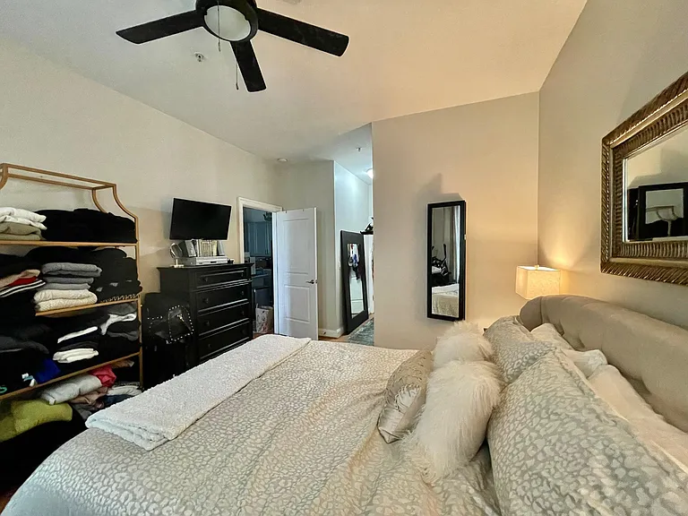 Bedroom w/ Designer Ceiling Fan.