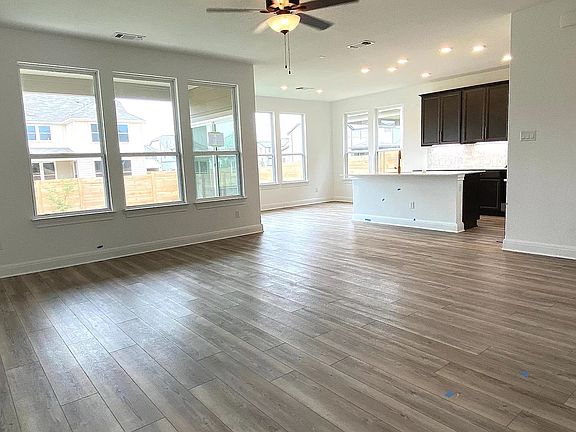 Family Room open to spacious Kitchen with an expansive island.