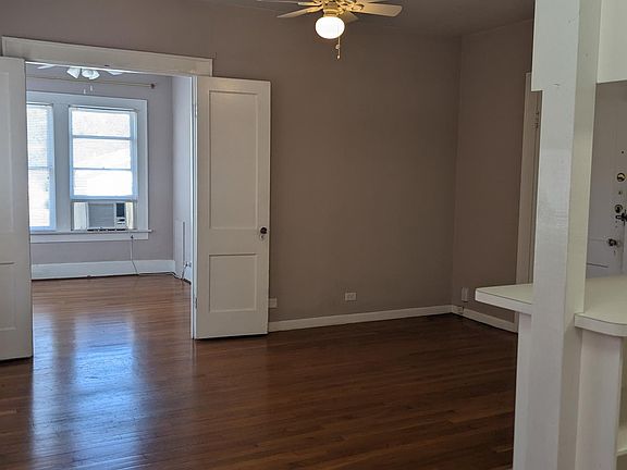 View from dining area looking towards the living room and bedroom.