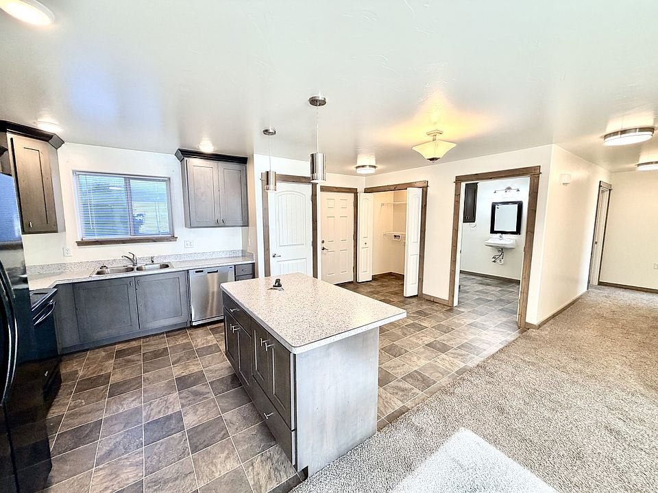 Open floor plan for kitchen, dining room and living room.