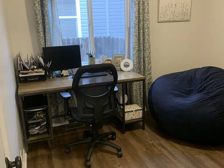 1st bedroom, currently used as an office, but would also be great for a kid's room. Good closet space.