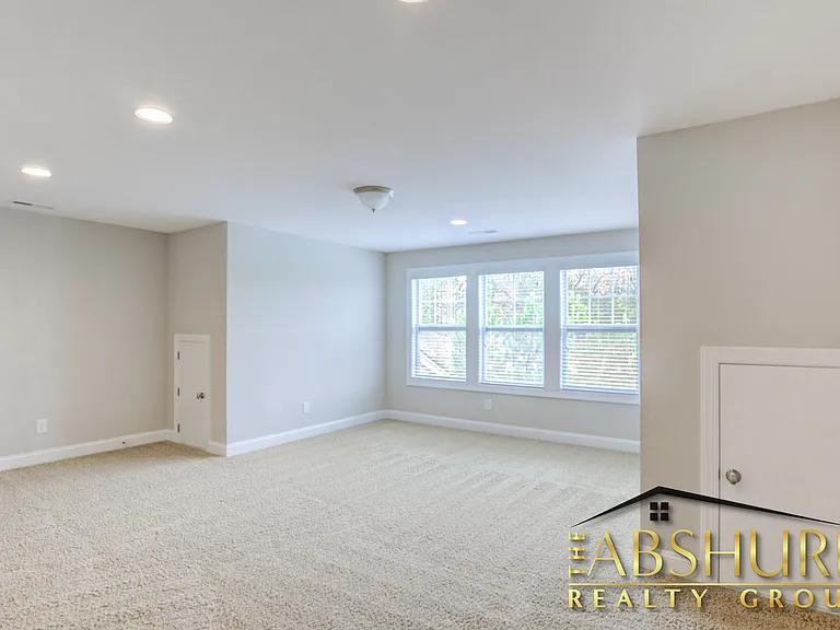 3rd floor suite with walk in closet, full bathroom, additional storage and efficient recessed lights