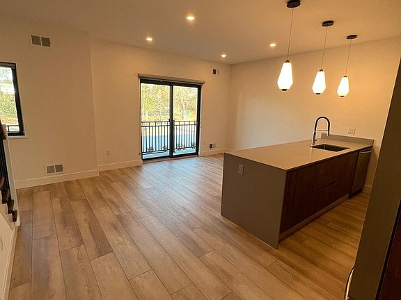 Sliding doors to private balcony.