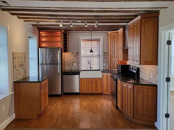Kitchen with cabinet lights and under counter lighting.
