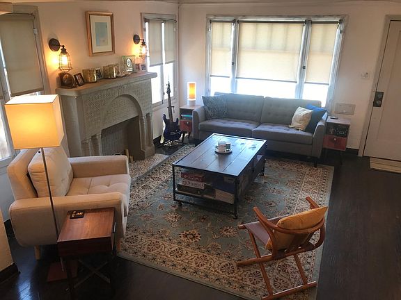 Living room* (*this is OTHER unit in the duplex when it was furnished. NOT the actual unit.. but the two units are very similar. Unit will NOT be furnished )