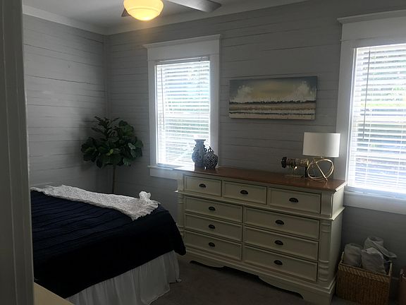 Beautiful light beams through the 1st bedroom