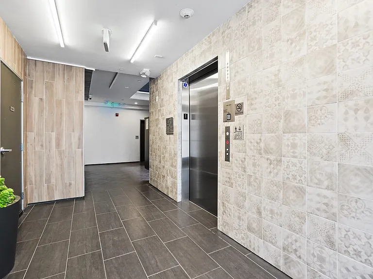 Elevator in Lobby Area of Dunn Station by Wiseman