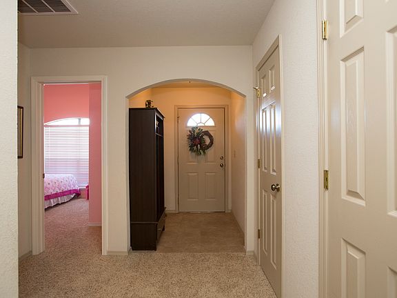 Tiled Entryway & Arched Doors