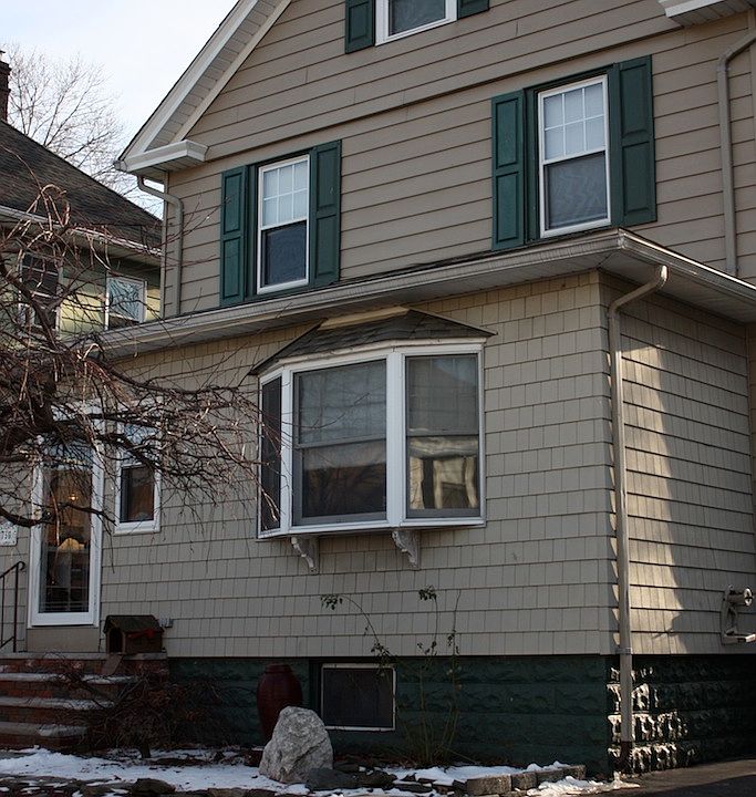 Front of house, 3 car drive