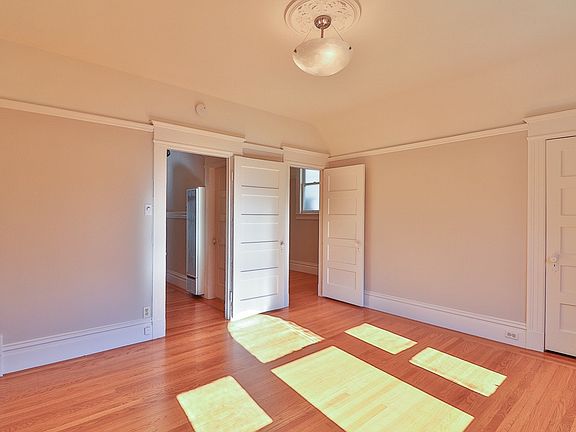 first bedroom with 2 walk-in closets
