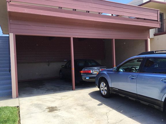 Carport with small storage at rear