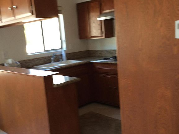 Kitchen with granite counters and stainless steel appliances