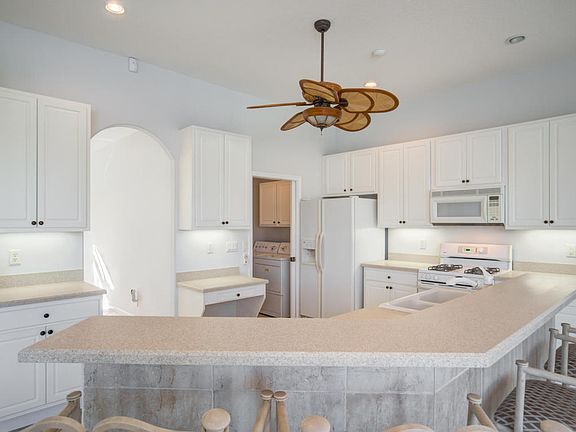 5th image of 513 Cocoplum Dr S