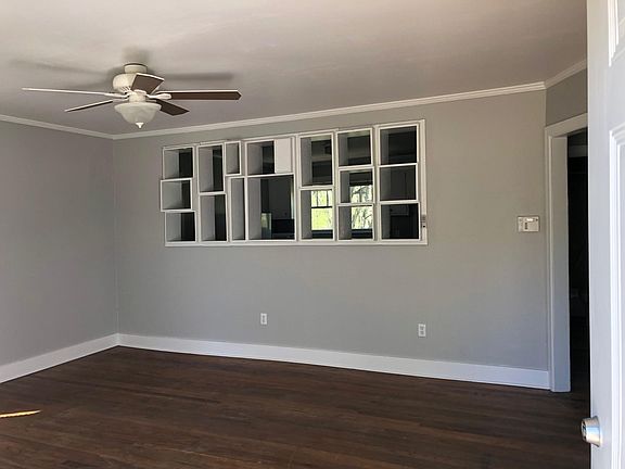 Living room opening to kitchen