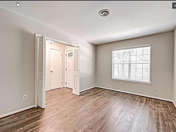 Exclusive office room with nice natural lighting for those wanting to work/study from home or could be used as a formal living/dining room.