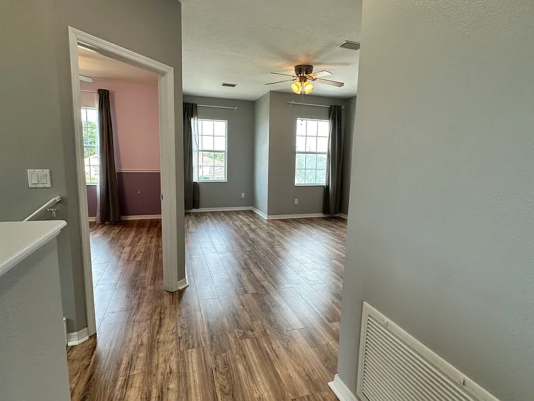 Exiting Primary. Secondary Bedroom to the left. Flex or multi purpose room to the right